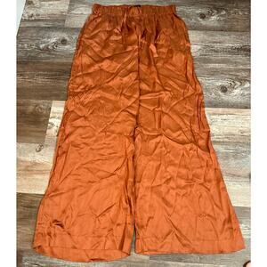 ABLE Anthropologie Wide Leg Satin Trousers In Burnt Orange